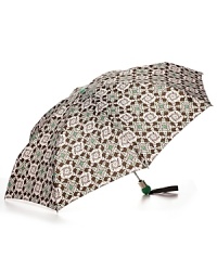 A stylish batik printed umbrella with a green logo handle and button top. A stylish batik printed umbrella with a green logo handle and button top.