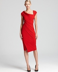 This sculpted Donna Karan New York dress has unique seam detail and a daring front slit for dramatic date night impact. This sculpted Donna Karan New York dress has unique seam detail and a daring front slit for dramatic date night impact.