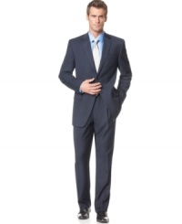 Bored with black? Change it up just enough with this sophisticated navy suit from Izod. Bored with black? Change it up just enough with this sophisticated navy suit from Izod.