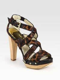 Natural wooden heel topped with small studs and leather trim, this leopard-print calf hair design exudes animal magnetism. Wooden heel, 4½ (115mm)Island platform, 1 (25mm)Compares to a 3½ heel (90mm)Leopard-print calf hair and leather upperLeather lining and solePadded insoleImported Natural wooden heel topped with small studs and leather trim, this leopard-print calf hair design exudes animal magnetism. Wooden heel, 4½ (115mm)Island platform, 1 (25mm)Compares to a 3½ heel (90mm)Leopard-print calf hair and leather upperLeather lining and solePadded insoleImported
