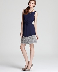 An easy Aqua dress is decorated with delightful lace at the skirt for a charming look with ladylike appeal. An easy Aqua dress is decorated with delightful lace at the skirt for a charming look with ladylike appeal.