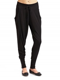 THE LOOKRibbed elastic waistband with drawstringSide draped pocketsRibbed and banded cuffs with zipper closuresTHE FITRise, about 12 Inseam, about 32THE MATERIAL40% nylon/30% viscose/30% mercerized woolCARE & ORIGINDry cleanImported THE LOOKRibbed elastic waistband with drawstringSide draped pocketsRibbed and banded cuffs with zipper closuresTHE FITRise, about 12 Inseam, about 32THE MATERIAL40% nylon/30% viscose/30% mercerized woolCARE & ORIGINDry cleanImported