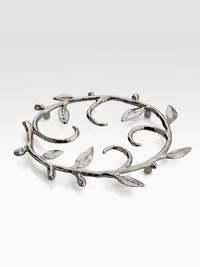 A nickelplated trivet takes its inspiration from the imagery that floats around classic storytelling. The shapes are obvious and immediate and, at the same time, impressionistic and lyrical. From the Vine CollectionNickelplated bronze10 X 8½Hand washImported A nickelplated trivet takes its inspiration from the imagery that floats around classic storytelling. The shapes are obvious and immediate and, at the same time, impressionistic and lyrical. From the Vine CollectionNickelplated bronze10 X 8½Hand washImported