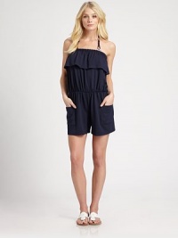 A pretty ruffle top gives this carefree design a romantic, must-have look.Elasticized topFront pockets92% rayon/8% spandexDry cleanImported A pretty ruffle top gives this carefree design a romantic, must-have look.Elasticized topFront pockets92% rayon/8% spandexDry cleanImported