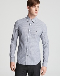 Add this stately striped button-down to your wardrobe for a handsome look you can pair with a variety of pants and jeans. Add this stately striped button-down to your wardrobe for a handsome look you can pair with a variety of pants and jeans.