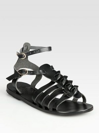 Add a touch of edge to any ensemble with this leather gladiator. finished with adjustable ankle straps. Leather upperLeather lining and soleMade in GreeceOUR FIT MODEL RECOMMENDS ordering true whole size; ½ sizes should order the next whole size up. Add a touch of edge to any ensemble with this leather gladiator. finished with adjustable ankle straps. Leather upperLeather lining and soleMade in GreeceOUR FIT MODEL RECOMMENDS ordering true whole size; ½ sizes should order the next whole size up.