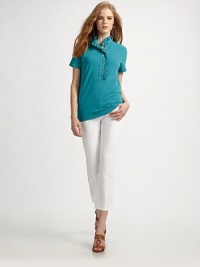 A classic design with a feminine twist thanks to a pretty ruffle stand collar.Ruffle stand collarRuffle-enhanced button placketSignature buttonsShort sleevesPull-on styleAbout 24 from shoulder to hem49% pima cotton/49% modal/2% Lycra®Machine washImported Model shown is 5'10 (177cm) wearing US size Small. A classic design with a feminine twist thanks to a pretty ruffle stand collar.Ruffle stand collarRuffle-enhanced button placketSignature buttonsShort sleevesPull-on styleAbout 24 from shoulder to hem49% pima cotton/49% modal/2% Lycra®Machine washImported Model shown is 5'10 (177cm) wearing US size Small.