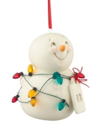 Brighten every day of the season with a snowman ornament that, tangled in red, gold and teal lights, beams with happiness and holiday spirit. Brighten every day of the season with a snowman ornament that, tangled in red, gold and teal lights, beams with happiness and holiday spirit.