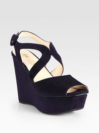 A strong platform wedge lifts this suede design with an adjustable ankle strap. Self-covered heel, 4½ (115mm)Covered platform, 1½ (40mm)Compares to a 3 heel (75mm)Suede upperAdjustable ankle strapLeather lining and solePadded insoleMade in Italy A strong platform wedge lifts this suede design with an adjustable ankle strap. Self-covered heel, 4½ (115mm)Covered platform, 1½ (40mm)Compares to a 3 heel (75mm)Suede upperAdjustable ankle strapLeather lining and solePadded insoleMade in Italy