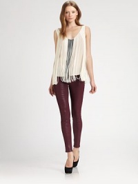 Swing into chic style with this flapper-inspired fringe design with beaded accents. V-neckSleevelessPull-on styleDrop U-backAbout 27 from shoulder to hemRayonDry cleanImported Model shown is 5'10 (177cm) wearing US size Small. Swing into chic style with this flapper-inspired fringe design with beaded accents. V-neckSleevelessPull-on styleDrop U-backAbout 27 from shoulder to hemRayonDry cleanImported Model shown is 5'10 (177cm) wearing US size Small.