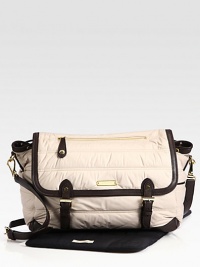 An ultra-versatile, ultra-functional messenger-style diaper bag featuring adjustable shoulder strap, plenty of pockets and matching changing pad.Adjustable shoulder strapMagnetic flap closureInside drawstring closureOutside zipper pocketInside open pocketsMatching changing padAbout 14W X 11H X 5DFully linedPolyesterImported An ultra-versatile, ultra-functional messenger-style diaper bag featuring adjustable shoulder strap, plenty of pockets and matching changing pad.Adjustable shoulder strapMagnetic flap closureInside drawstring closureOutside zipper pocketInside open pocketsMatching changing padAbout 14W X 11H X 5DFully linedPolyesterImported