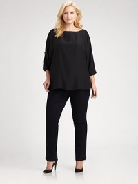 A luxurious style made from matte silk and featuring elegant embellishments. Pair this relaxed-fit blouse with slim-fitting pants or skinny jeans.Round neckCold shouldersEmbellishments along three-quarter sleevesPull-on styleSide slitsAbout 24 from shoulder to hemSilkDry cleanImported A luxurious style made from matte silk and featuring elegant embellishments. Pair this relaxed-fit blouse with slim-fitting pants or skinny jeans.Round neckCold shouldersEmbellishments along three-quarter sleevesPull-on styleSide slitsAbout 24 from shoulder to hemSilkDry cleanImported