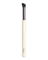 A large angled brush specially designed to highlight under or along the brow bone. Made of luxuriously soft black squirrel. A large angled brush specially designed to highlight under or along the brow bone. Made of luxuriously soft black squirrel.