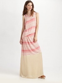 Asymmetrical stripes and a uniquely draped side characterize this lengthy, silk-trimmed silhouette. CrewneckSleevelessPull-on styleAbout 40 from natural waistSilk trim45% cotton/25% modal/24% polyester/6% rayonHand washMade in USA of imported fabricModel shown is 5'9½ (176cm) wearing US size 4. Asymmetrical stripes and a uniquely draped side characterize this lengthy, silk-trimmed silhouette. CrewneckSleevelessPull-on styleAbout 40 from natural waistSilk trim45% cotton/25% modal/24% polyester/6% rayonHand washMade in USA of imported fabricModel shown is 5'9½ (176cm) wearing US size 4.