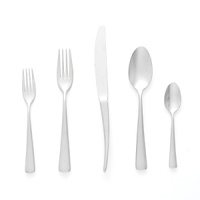 Designed by Savniel et Roze, Christofle's Élémentaire flatware features smooth, shapely lines in matte stainless steel. Designed by Savniel et Roze, Christofle's Élémentaire flatware features smooth, shapely lines in matte stainless steel.