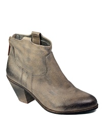 Tough, distressed leather and a Western-inspired look showcase a laid-back bootie from Sam Edelman.
