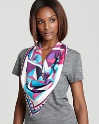 Emilio Pucci trades its signature swirls for a vibrant geometric print in pinks, purples and blues. Emilio Pucci trades its signature swirls for a vibrant geometric print in pinks, purples and blues.