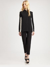 Timelessly tailored silk shirt, rejuvenated by shadow-inspired contrast paneling that visually slims the waist. Point collarLong sleeves with buttoned cuffsHidden button frontSilkDry cleanImportedModel shown is 5'10 (177cm) wearing US size 2. Timelessly tailored silk shirt, rejuvenated by shadow-inspired contrast paneling that visually slims the waist. Point collarLong sleeves with buttoned cuffsHidden button frontSilkDry cleanImportedModel shown is 5'10 (177cm) wearing US size 2.