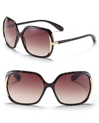 Sleek plastic sunglasses with metal detail and signature logo at temple. Sleek plastic sunglasses with metal detail and signature logo at temple.