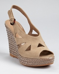 A textured, metallic wedge heel and tortoise buckle at the ankle add special details to Bruno Magli's Romane espadrilles. A textured, metallic wedge heel and tortoise buckle at the ankle add special details to Bruno Magli's Romane espadrilles.