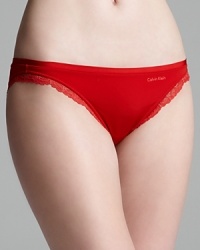 Solid bikini with lace trim from Calvin Klein Underwear. Style #F3278 Solid bikini with lace trim from Calvin Klein Underwear. Style #F3278