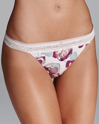 With a floral front and lace back, this cheeky Calvin Klein bikini reveals just enough. Style #F3324. With a floral front and lace back, this cheeky Calvin Klein bikini reveals just enough. Style #F3324.