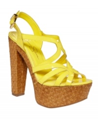 The Cizal platform sandals by Jessica Simpson mix up textures with curving patent and leather straps atop a natural wicker platform and high heel. The Cizal platform sandals by Jessica Simpson mix up textures with curving patent and leather straps atop a natural wicker platform and high heel.