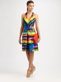 Pleated halter dress with an exposed back zipper, artfully crafted in vibrant, painterly stripes. HalterPlunging v-neckSlash pocketsBack zipperAbout 22 from natural waistCottonDry cleanMade in USA of Italian fabricModel shown is 5'9½ (176cm) wearing US size 2.