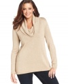 Stay chic in the cold with Jones New York Signature's metallic plus size sweater, finished by a cowl neckline.
