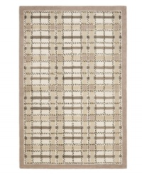 A traditional basketweave plaid is updated for the modern home in this area rug only from Martha Stewart rugs. Hand tufted in India of long wool fibers, this luxurious home accent presents unparalleled comfort and style underfoot. A traditional basketweave plaid is updated for the modern home in this area rug only from Martha Stewart rugs. Hand tufted in India of long wool fibers, this luxurious home accent presents unparalleled comfort and style underfoot.