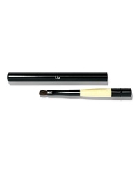 This portable brush is ideal for lip touch-ups throughout the day. The Retractable Lip Brush features a deluxe brush head with short, tapered hairs for precise application. A brush cap (pictured on handle of brush) protects bristles when brush isn't in use. Also available, professional-size Lip Brush.