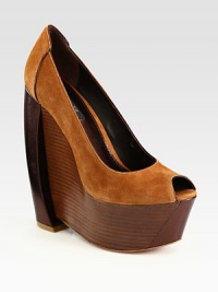 Uplifted by an alarmingly high stacked wedge and platform, this suede pump has unique metallic leather inserts and a peep toe. Stacked and metallic leather wedge, 6 (150mm)Stacked platform, 2 (50mm)Compares to a 4 heel (100mm)Suede and metallic leather upperLeather lining and solePadded insoleImported Uplifted by an alarmingly high stacked wedge and platform, this suede pump has unique metallic leather inserts and a peep toe. Stacked and metallic leather wedge, 6 (150mm)Stacked platform, 2 (50mm)Compares to a 4 heel (100mm)Suede and metallic leather upperLeather lining and solePadded insoleImported