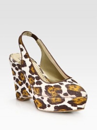 A leopard print lends fierce style to this slingback pump in rich Italian canvas, heightened by a sturdy wedge. Self-covered wedge, 4 (100mm)Covered platform, 1½ (40mm)Compares to a 2½ heel (65mm)Canvas upper with faux leather trimPoint toeElasticized slingback strapFaux leather lining and solePadded insoleMade in Italy A leopard print lends fierce style to this slingback pump in rich Italian canvas, heightened by a sturdy wedge. Self-covered wedge, 4 (100mm)Covered platform, 1½ (40mm)Compares to a 2½ heel (65mm)Canvas upper with faux leather trimPoint toeElasticized slingback strapFaux leather lining and solePadded insoleMade in Italy
