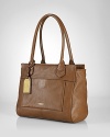 Sized right for office to off-duty, this Lauren Ralph Lauren tote is classically crafted in leather with a spacious interior and an easy access exterior pocket.