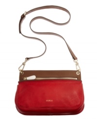 The chicest way to take the city by storm? The Groove Crossbody bag from Furla. Rich leather covers this versatile design while contrast trim and goldtone hardware add refined style sure to turn a few heads. The chicest way to take the city by storm? The Groove Crossbody bag from Furla. Rich leather covers this versatile design while contrast trim and goldtone hardware add refined style sure to turn a few heads.
