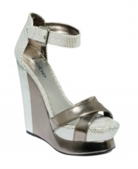 Bebe's Paisley wedge sandals feature leather metallic dots and shiny metallic straps for a look that's fashion-forward and fearless. Bebe's Paisley wedge sandals feature leather metallic dots and shiny metallic straps for a look that's fashion-forward and fearless.