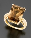 A bold and beautiful look of your very own. Ring features emerald-cut smoky quartz (21-3/4 ct. t.w.) set in 14k gold.