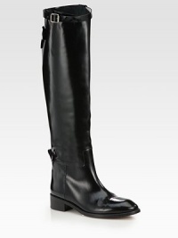 Sleek straps complement this ultra-tall design, impeccably constructed of fine Italian leather. Stacked heel, 1½ (40mm)Shaft, 20½Leg circumference, 16Leather upperPull-on styleAdjustable buckle strap and snap closureLeather lining and solePadded insoleMade in ItalyOUR FIT MODEL RECOMMENDS ordering true size. Sleek straps complement this ultra-tall design, impeccably constructed of fine Italian leather. Stacked heel, 1½ (40mm)Shaft, 20½Leg circumference, 16Leather upperPull-on styleAdjustable buckle strap and snap closureLeather lining and solePadded insoleMade in ItalyOUR FIT MODEL RECOMMENDS ordering true size.