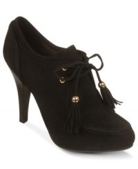 Walk the line in Fergalicious' Bratty platform shooties. With a lace-up vamp and cool tassel ties, this fun pump will upgrade any outfit. Walk the line in Fergalicious' Bratty platform shooties. With a lace-up vamp and cool tassel ties, this fun pump will upgrade any outfit.