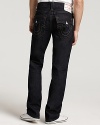 True Religion's straight leg, low rise jeans with signature horseshoes pocket styling in a bold, dark wash.