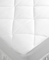Relax upon a bed of luxury. This hypoallergenic mattress pad from Calvin Klein features a large diamond quilt pattern and lofty fiber fill that mimics the qualities of down for an exceptionally comfortable addition to your bed. The spandex skirt keeps the pad secure and in place.