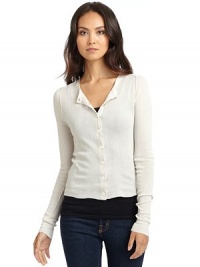THE LOOKRibbed, cropped design Round neckline Front button closure Long sleeves Exposed seam details THE FITAbout 20 from shoulder to hemTHE MATERIALCottonCARE & ORIGINDry cleanImportedModel shown is 5'11 (180cm) wearing US size Small. THE LOOKRibbed, cropped design Round neckline Front button closure Long sleeves Exposed seam details THE FITAbout 20 from shoulder to hemTHE MATERIALCottonCARE & ORIGINDry cleanImportedModel shown is 5'11 (180cm) wearing US size Small.