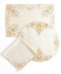 Swirling blooms embroidered in white or gold cut beautifully into Lancelot napkins for decor in need of old-world elegance. A scalloped edge echoes the classic motif as it scrolls from corner to corner. Swirling blooms embroidered in white or gold cut beautifully into Lancelot napkins for decor in need of old-world elegance. A scalloped edge echoes the classic motif as it scrolls from corner to corner.