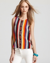 A brilliant Parker top puts an editorial spin on spring's tribal runway trend, creating an entrancing look to offset your crispest staples and chicest accents. A brilliant Parker top puts an editorial spin on spring's tribal runway trend, creating an entrancing look to offset your crispest staples and chicest accents.
