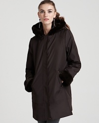 This sophisticated Marc New York Plus coat features an A-line silhouette and winter-loving details like faux fur lining from the plush hood to the oversized cuffs. This sophisticated Marc New York Plus coat features an A-line silhouette and winter-loving details like faux fur lining from the plush hood to the oversized cuffs.