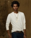 A long-sleeved jersey Henley is constructed in lightweight cotton and washed for a soft, natural fade.