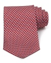 This handsome silk tie from Salvatore Ferragamo, cut in a classic silhouette for traditional appeal, helps you transition from the office into your evening affairs.