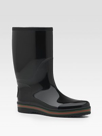 Rubber rain boot with signature trim and interlocking G on back.Rubber upperRubber soleMade in ItalyPlease note: For best fit please size down one full size. Rubber rain boot with signature trim and interlocking G on back.Rubber upperRubber soleMade in ItalyPlease note: For best fit please size down one full size.
