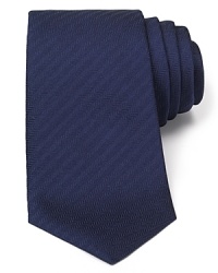 An impeccable herringbone tie made with artisan precision, featuring Turnbull & Asser's unique slip stitch detailing for a lifetime of shape retention. Revivify your wardrobe with a dose of classic luxury. An impeccable herringbone tie made with artisan precision, featuring Turnbull & Asser's unique slip stitch detailing for a lifetime of shape retention. Revivify your wardrobe with a dose of classic luxury.