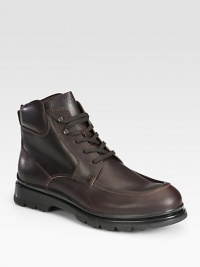 The fit and craftsmanship of an outdoor-inspired style with rugged appeal, designed in a smooth, leather lace-up style.Leather upperLeather liningPadded insoleRubber soleMade in Italy The fit and craftsmanship of an outdoor-inspired style with rugged appeal, designed in a smooth, leather lace-up style.Leather upperLeather liningPadded insoleRubber soleMade in Italy